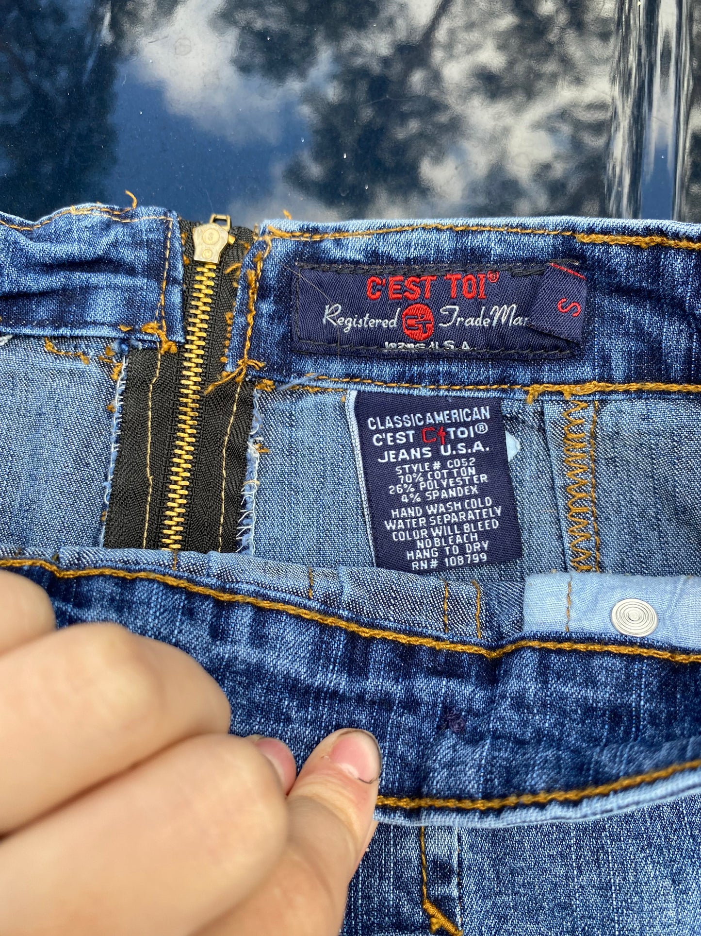 Pleaded denim mini skirt